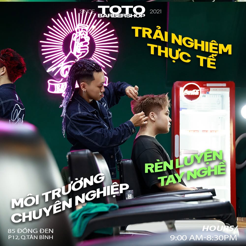 Young barbers practicing at TOTO Academy